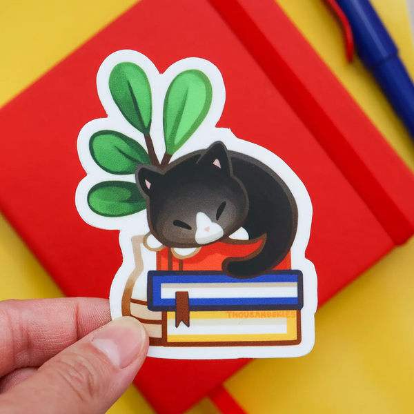 Vinyl Sticker Cat Napping on Books